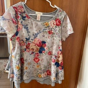 Sundance T with floral overlay.